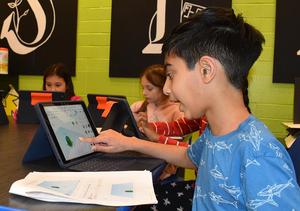 Mars Area Elementary School fourth-graders use TinkerCAD software to create clay-cutting and imprinting tools that will used as part of an art project to make decorative tea light lanterns.