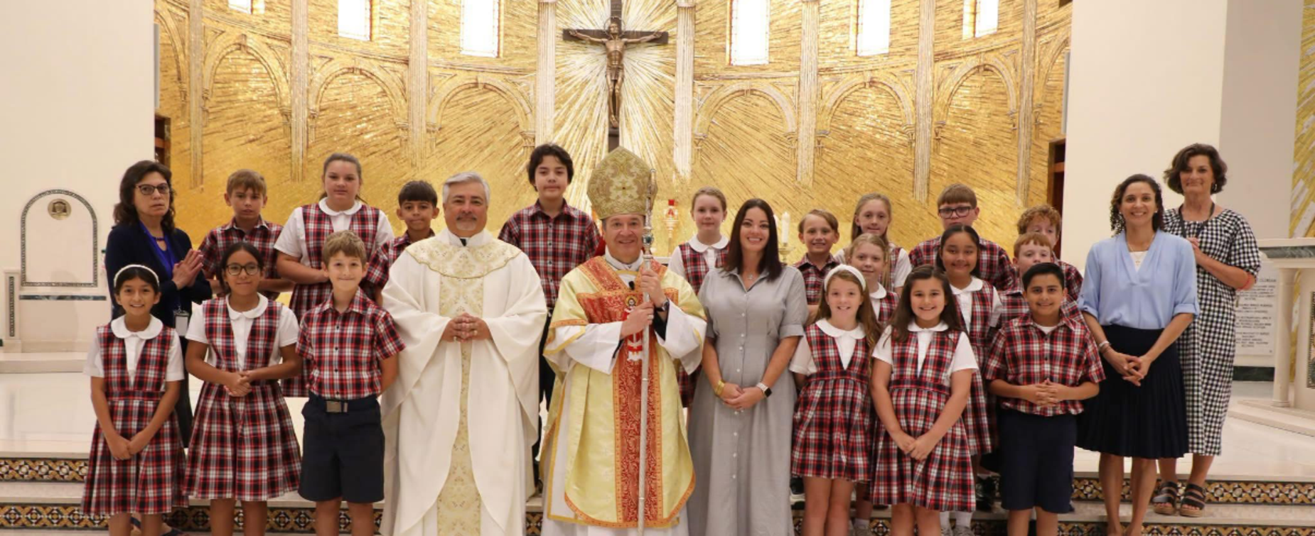SHS 4th and 5th grade students and staff pictured with Bishop Aviles and Fr. Ray at the Corpus Christi Cathedral