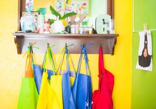 aprons hanging at after school program