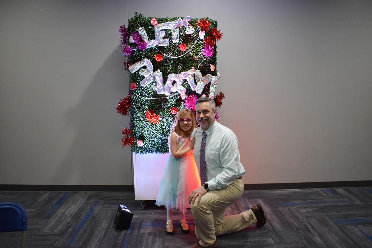 daddy & Me dance photo with father and daughter with colorful background