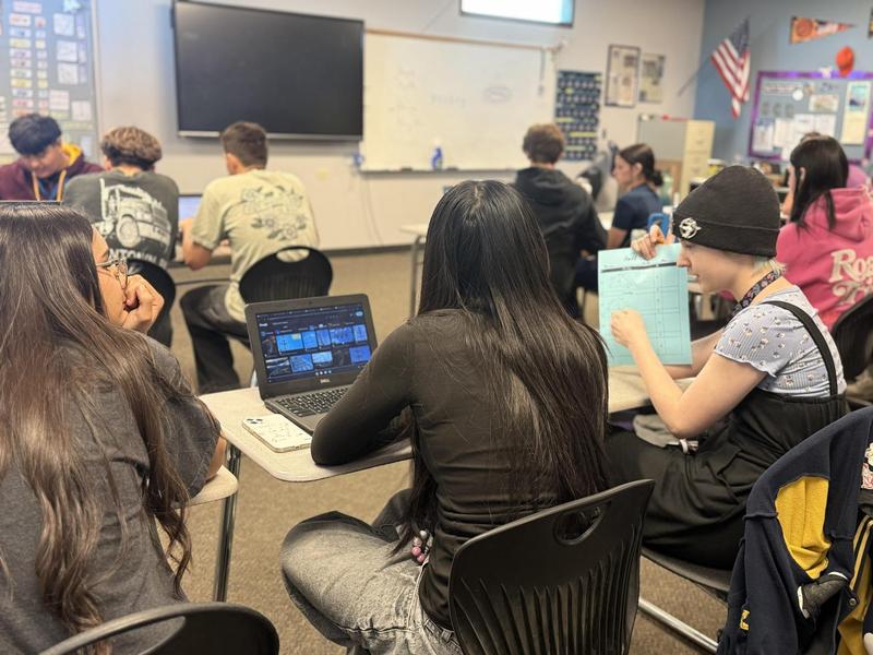 student learning about roller coasters