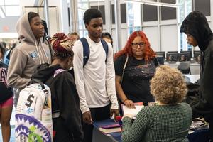 A student gets a book signed by Julie Berry