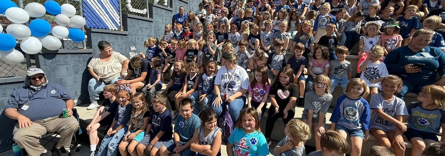 SES students sitting in stadium at Northwood High