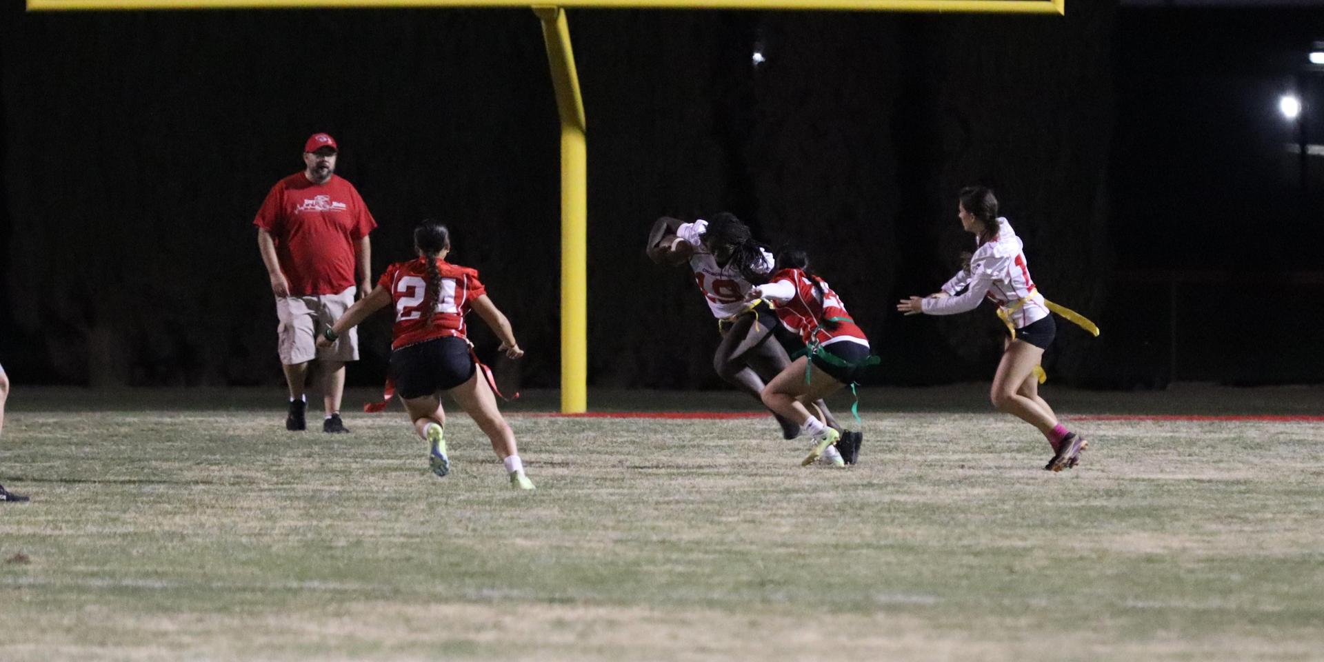 girls playing flag football