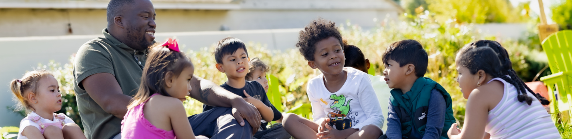 Preschool outdoor classroom with teacher