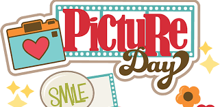 picture day sign with camera, red heart and a sign that says smile