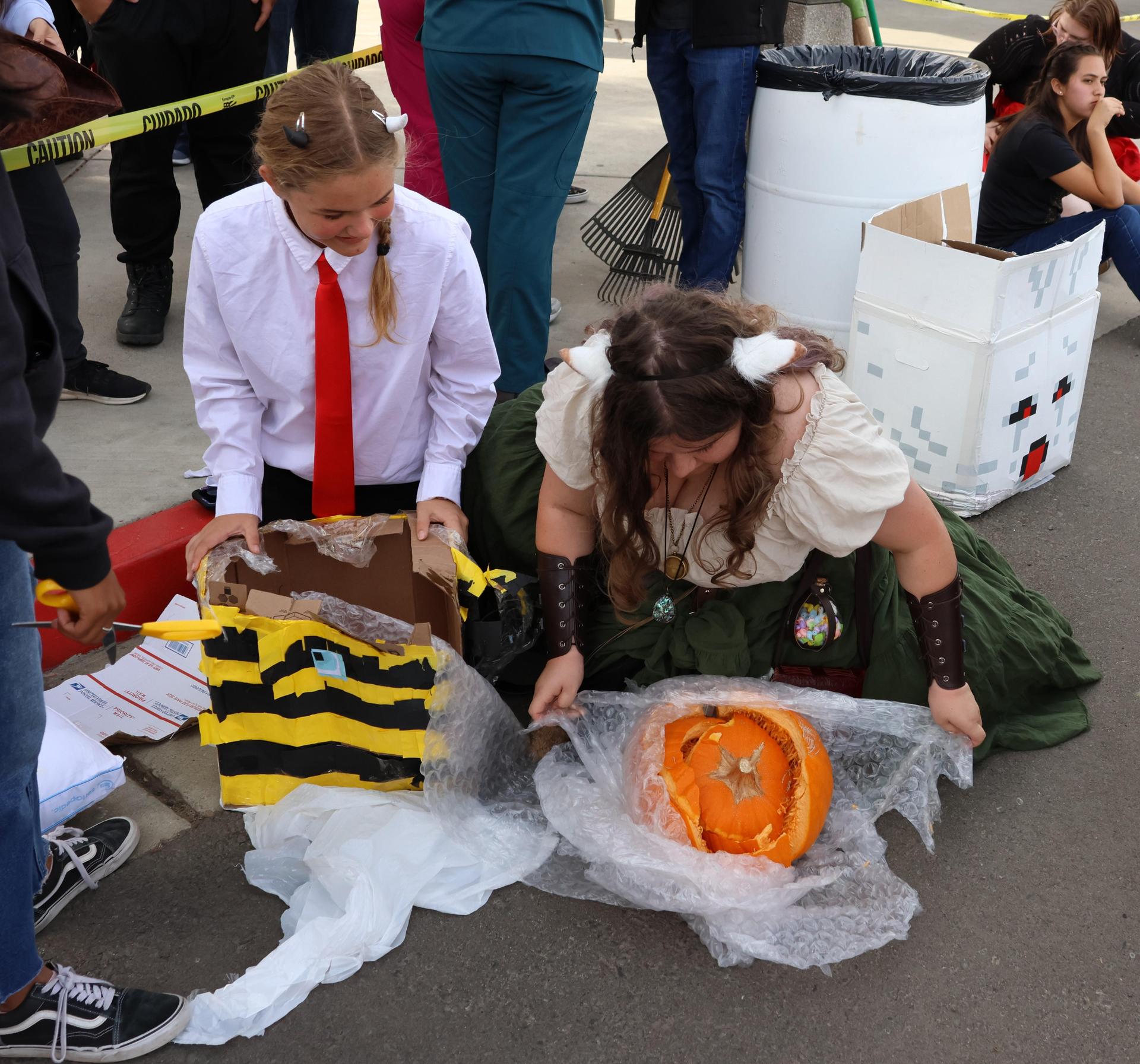 students and staff enjoying the pumpkin drop