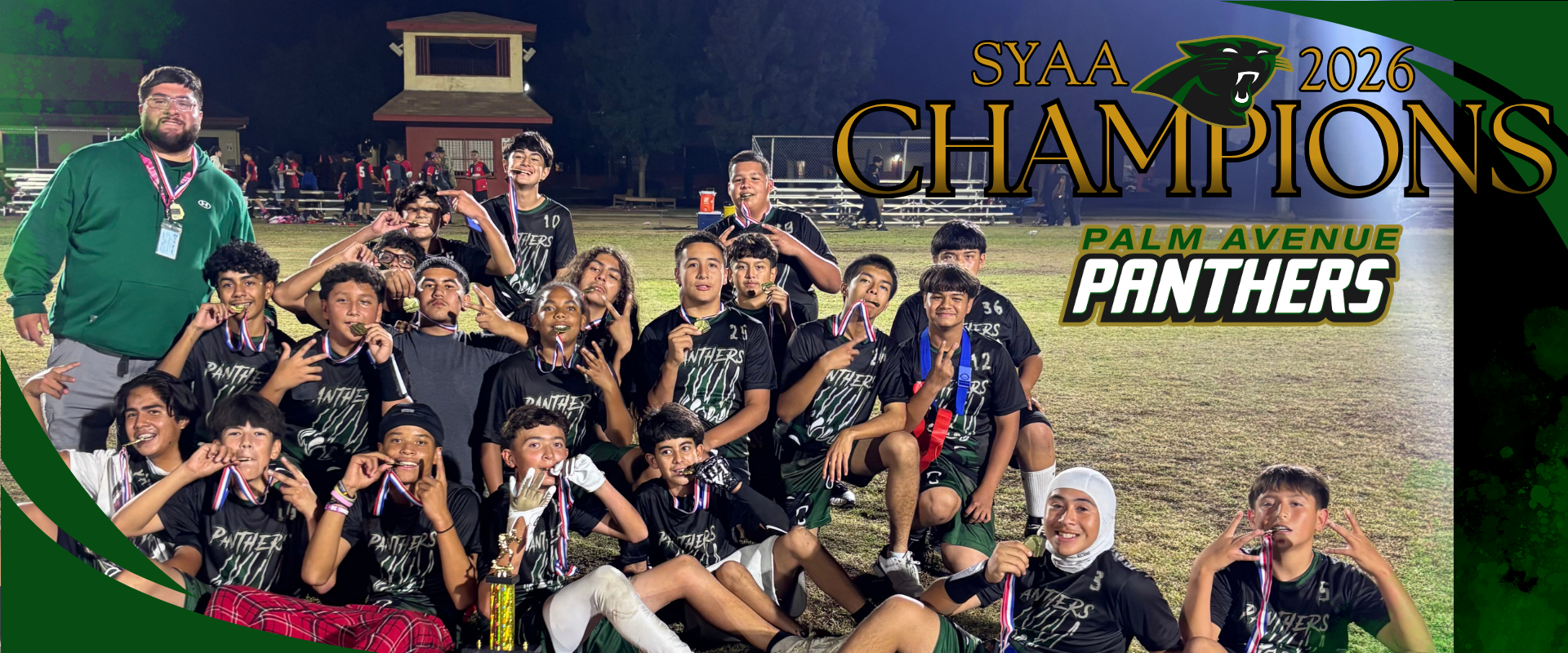 Group of young soccer players celebrating their championship victory.