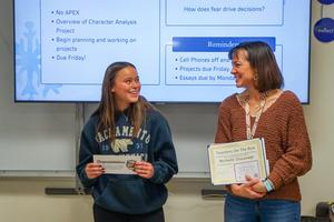 Michelle Discavage smiles at Zoey Beckham during presentation