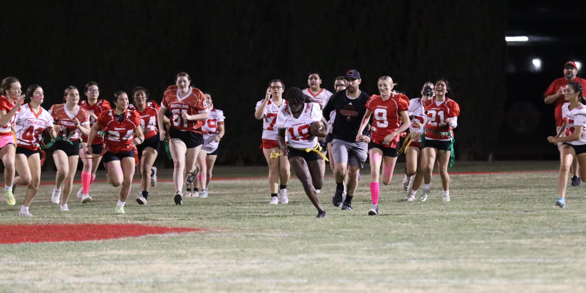 girls playing flag football