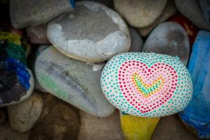 Rocks with one that has a painted heart