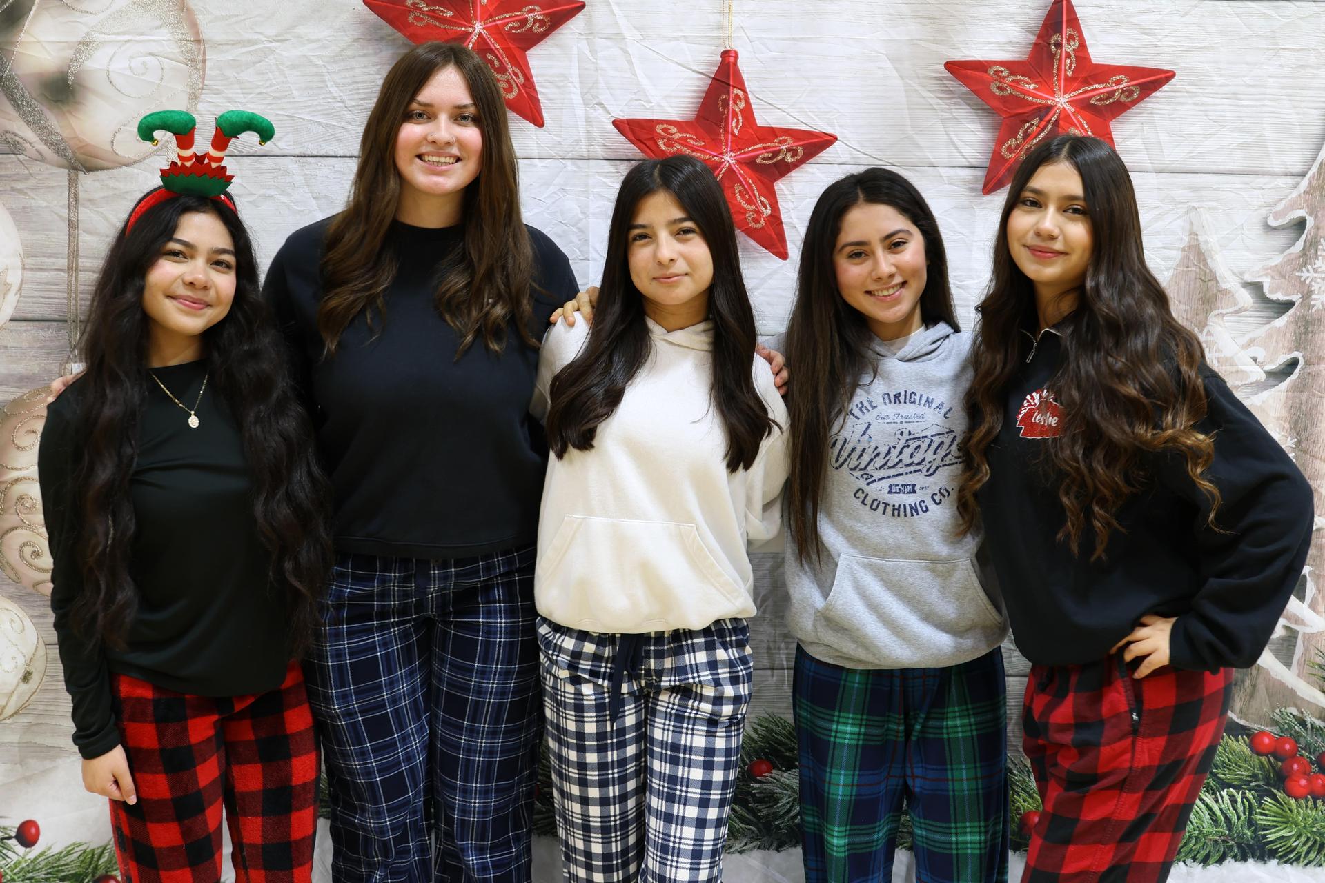 students and staff posing at the winter wishes rally