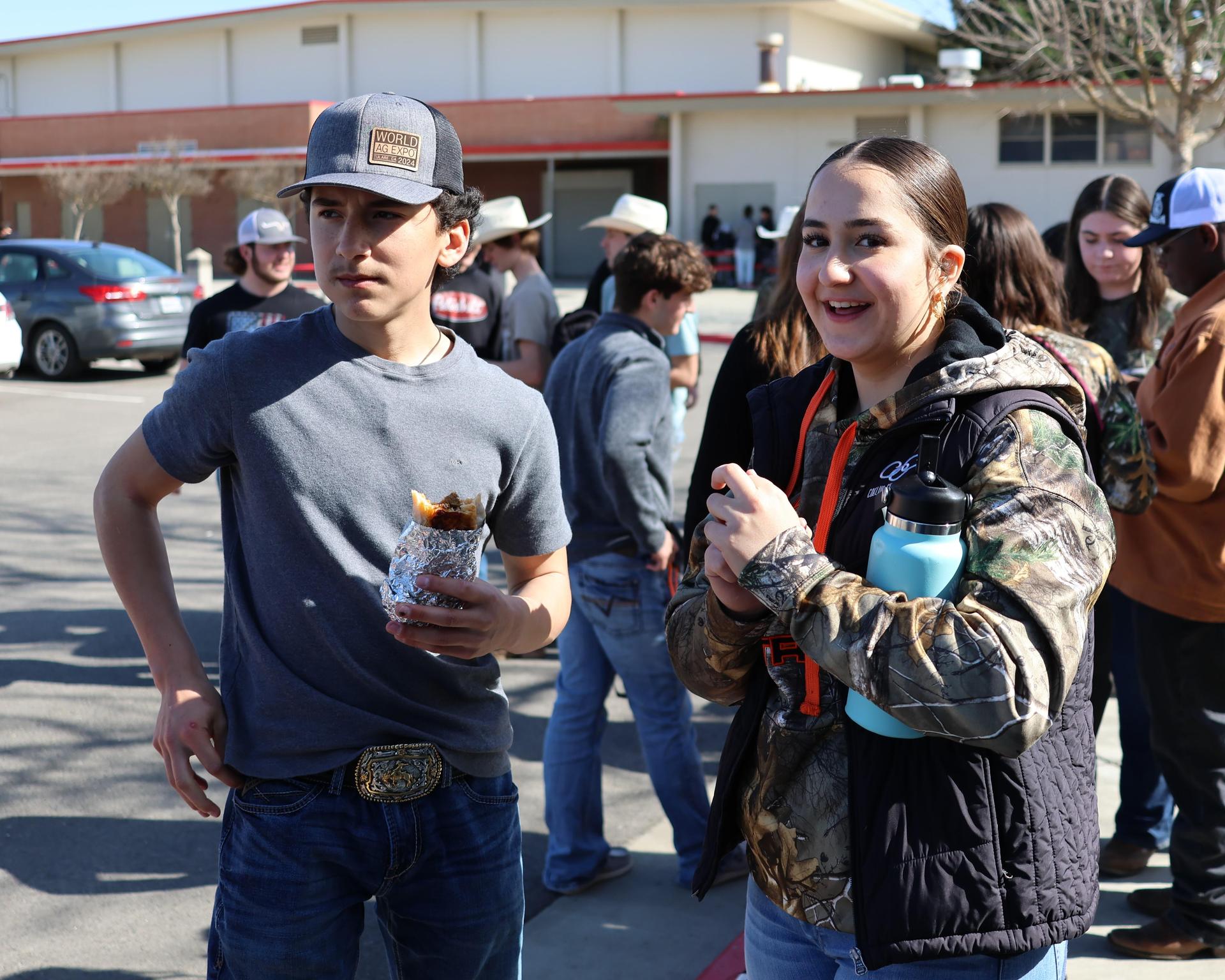 students and staff enjoying the truck pull
