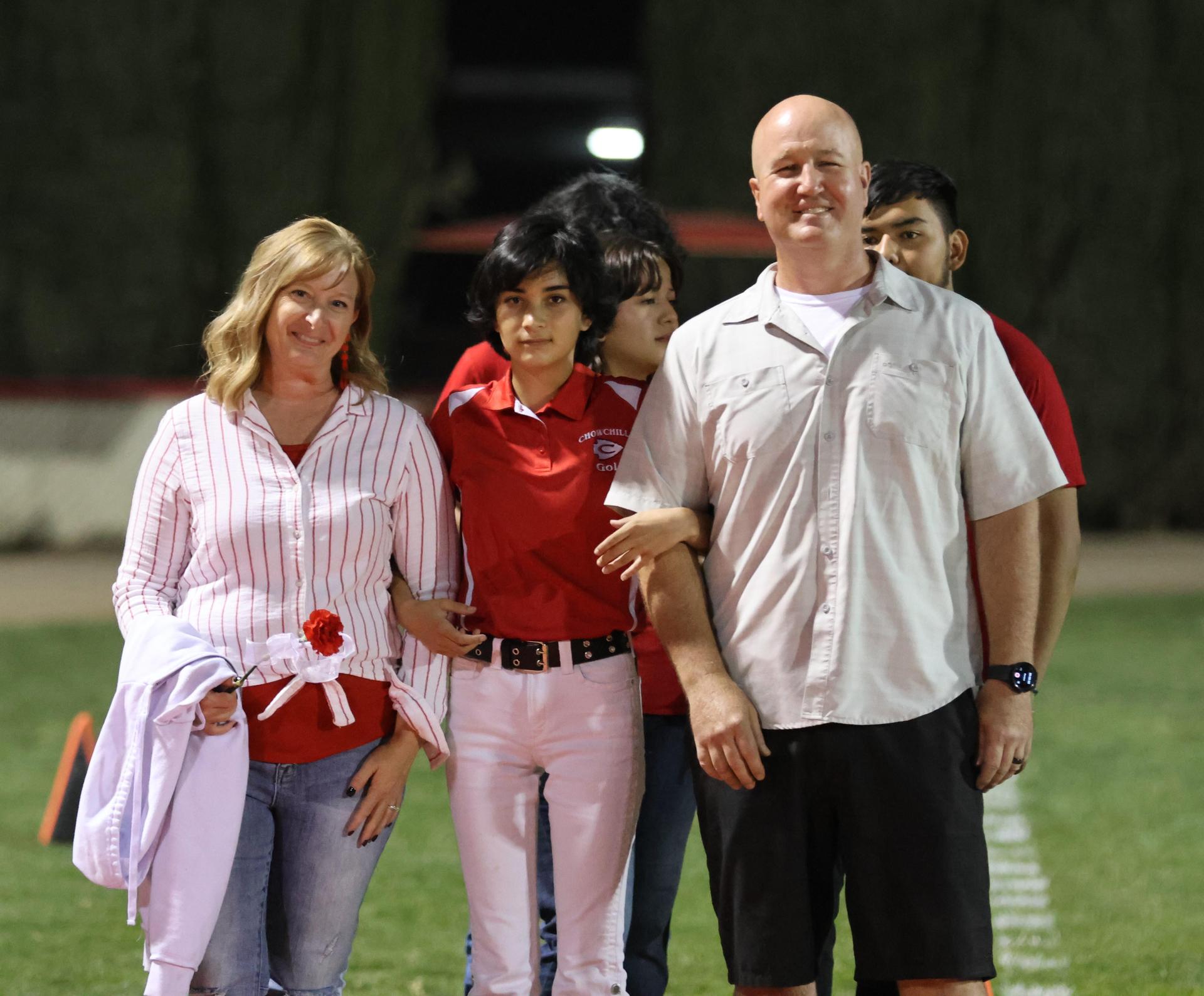 seniors and their escorts celebrating senior night
