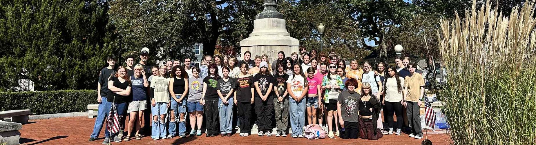 MHS Artists behind the painting at the Oval this year