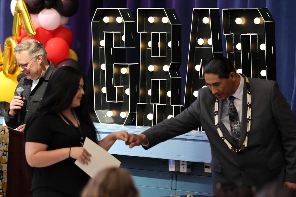 Title VI chairperson celebrates student graduate