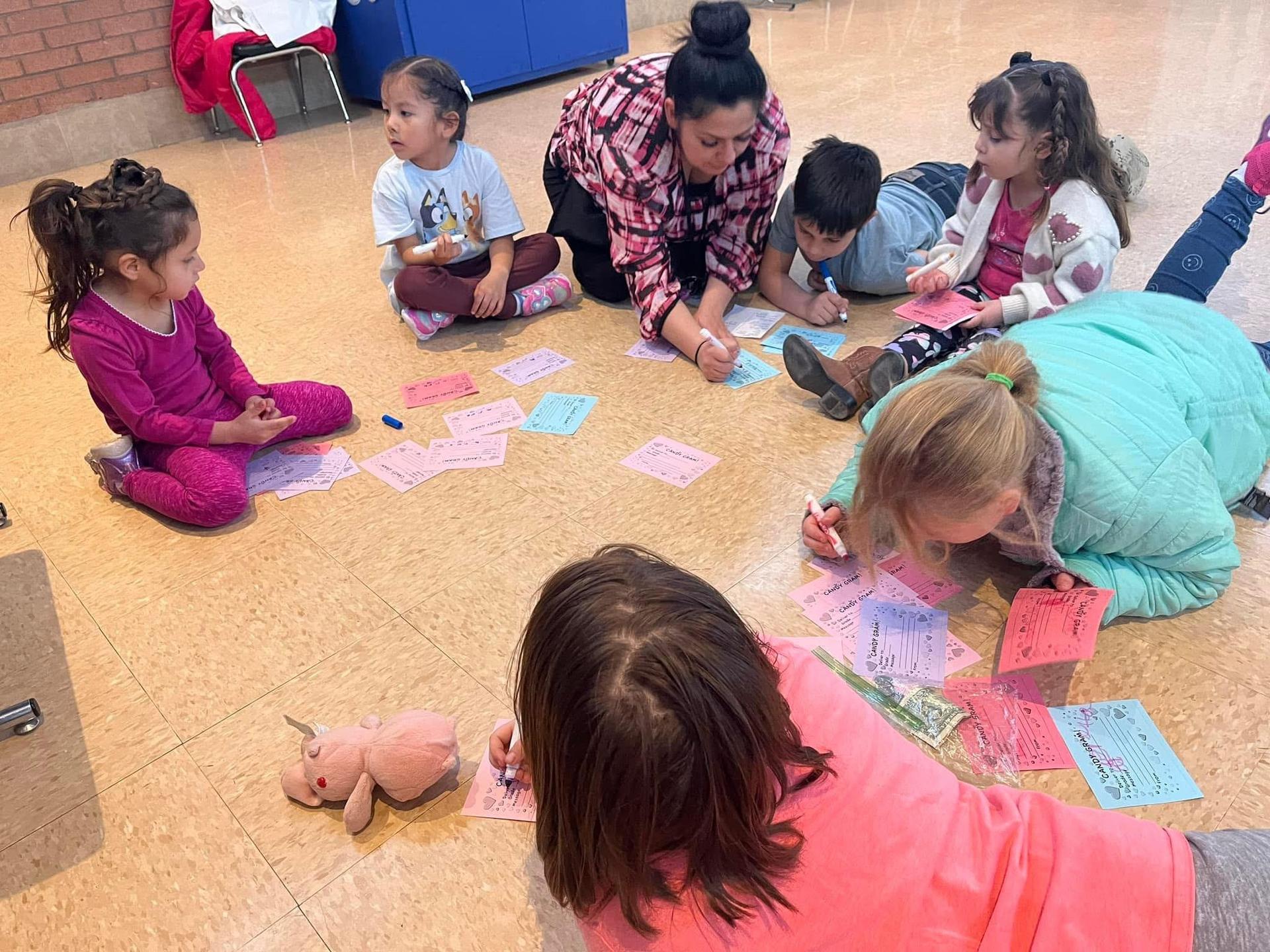 Students make candy grams for friends