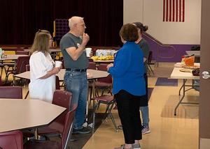 School officials discuss logistics.