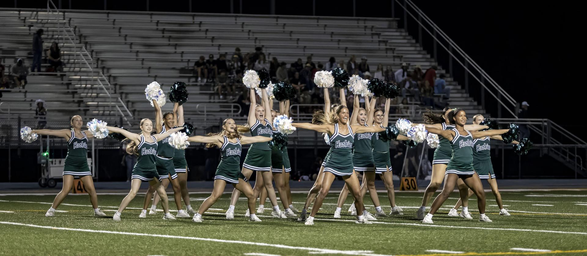Dance team on the field performing