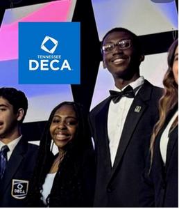 Smiling group of students, some with awards