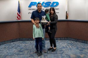people posing in the governing board room