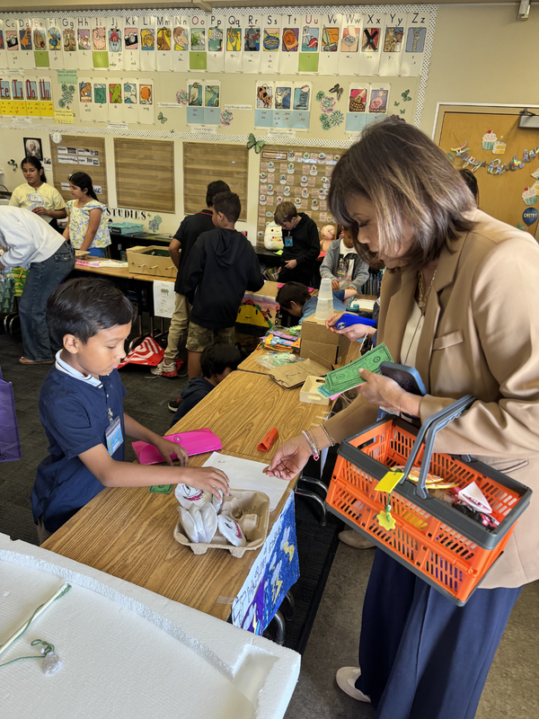 Superintendent shopping at Boom Town 2026