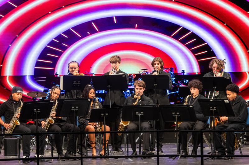 The jazz band performs on stage