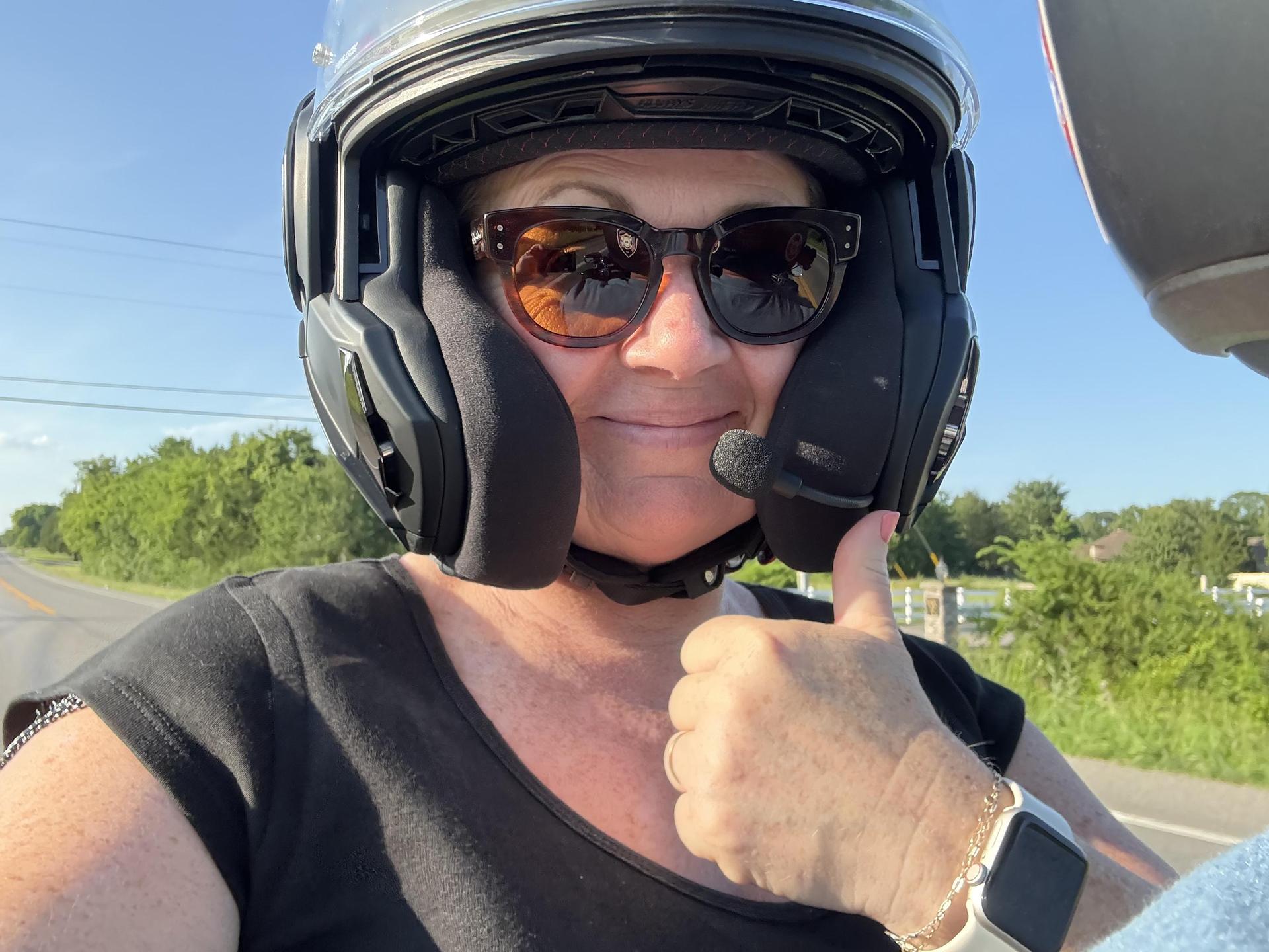 Dr. Oliver on a motorcycle