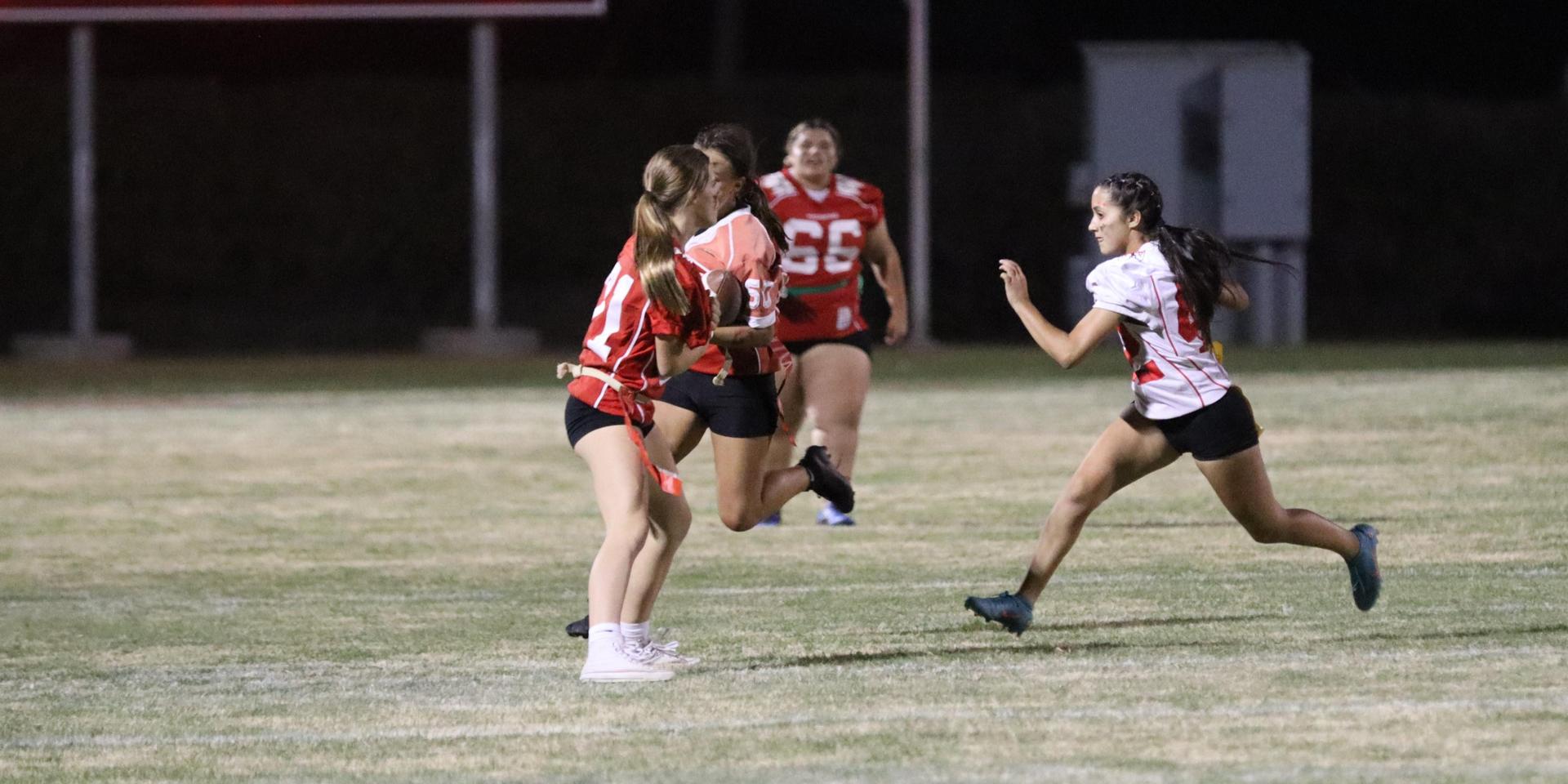 girls playing flag football