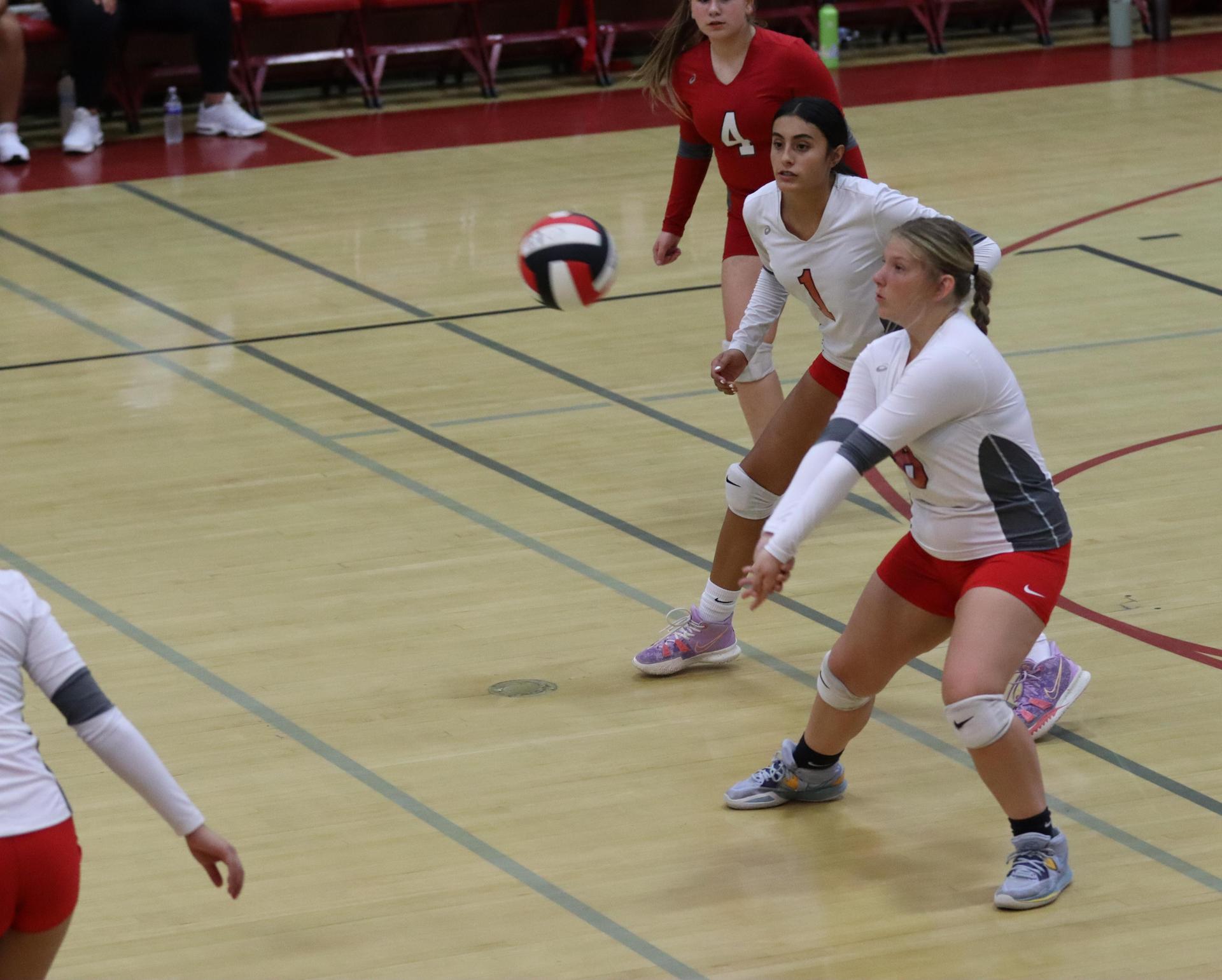 junior varsity girls playing volleyball against Liberty