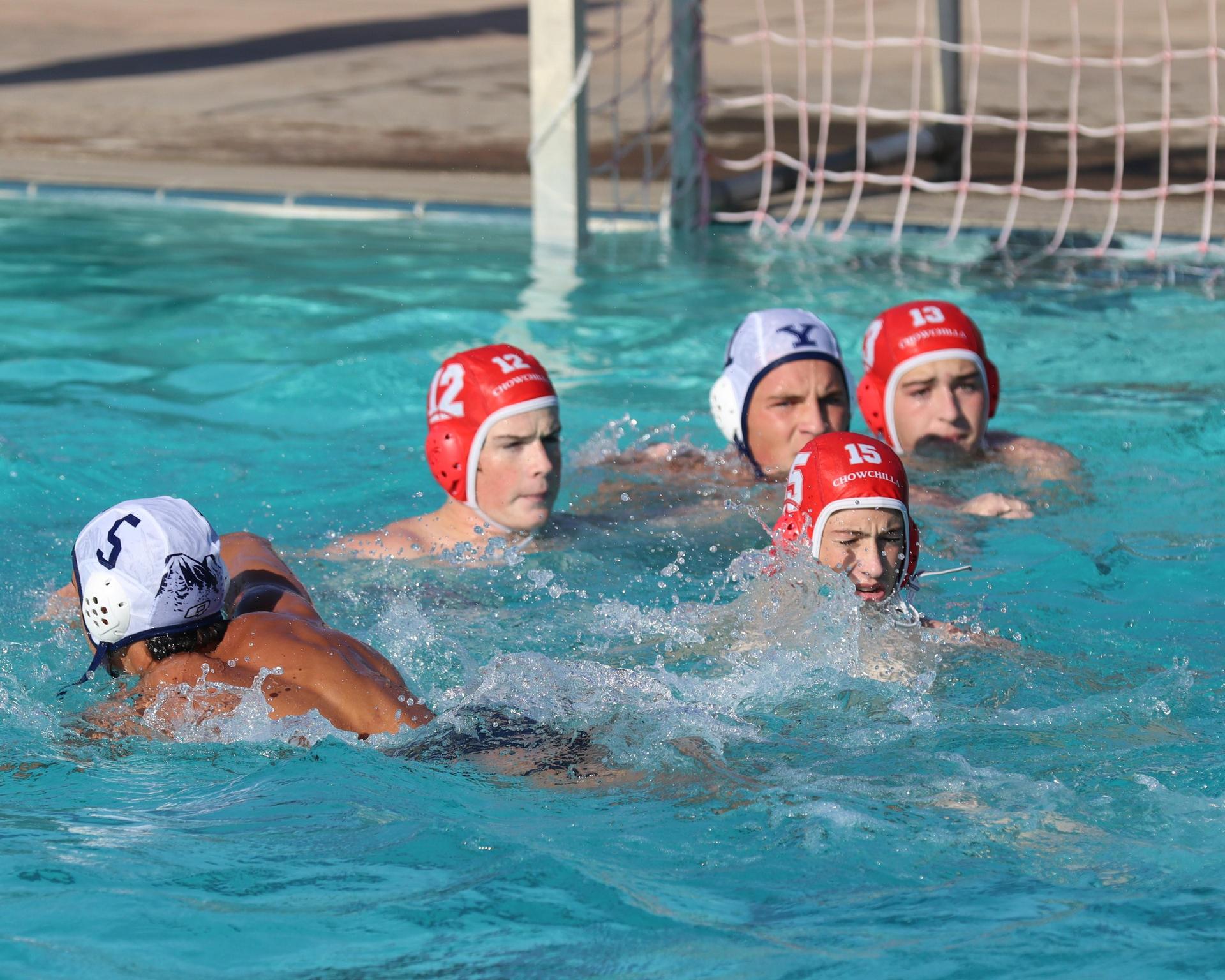 Boys playing water polo against Yosemite