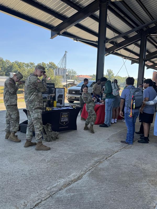 PHS students at the career fair, meeting with different people at tables