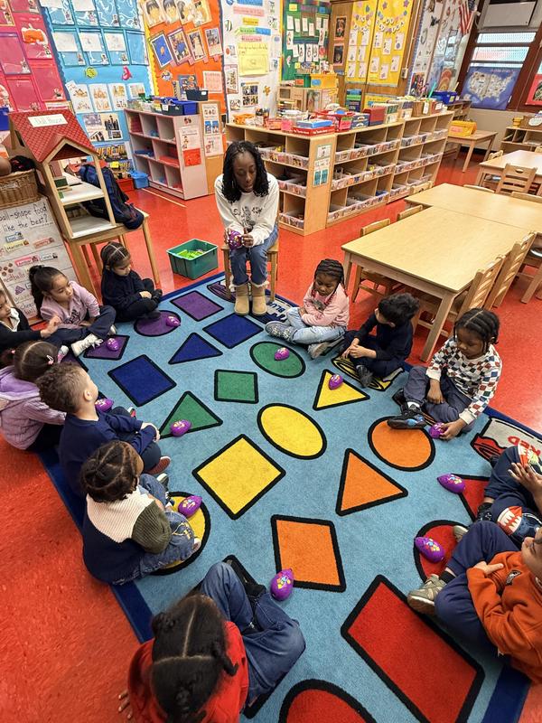 Students in STEAM class exploring a purple mouse and how to control it