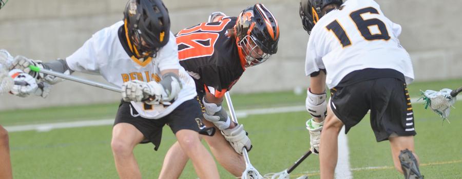 Boys lacrosse playing York Suburban