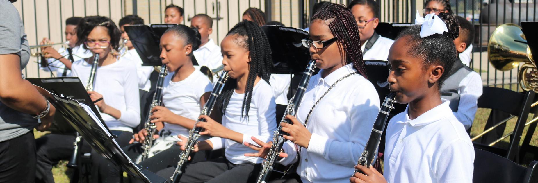 KBCP band performing at the groundbreaking