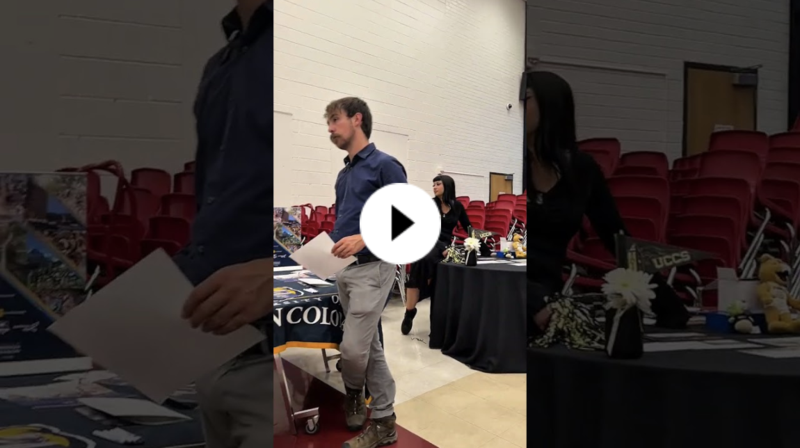 YouTube thumbnail showing a college fair in a high school cafeteria