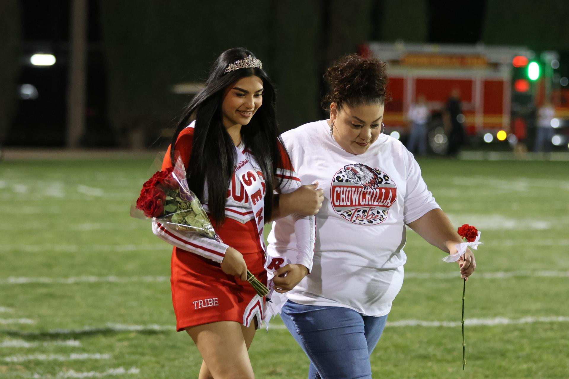 seniors and their escorts celebrating senior night