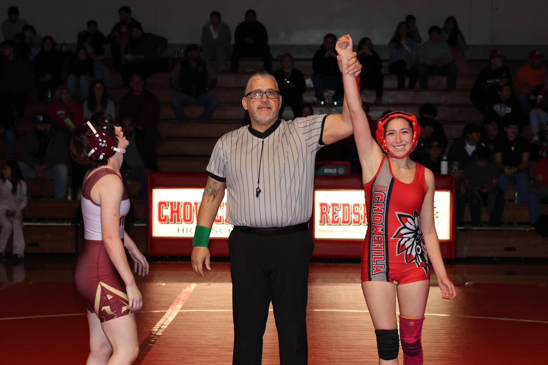 Wrestling winners with hands up 10