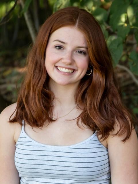 DVFriends Student smiling towards camera