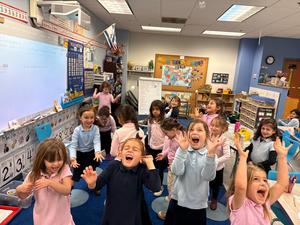 The kindergarten boys catch sight-words in their snowing sight word game!