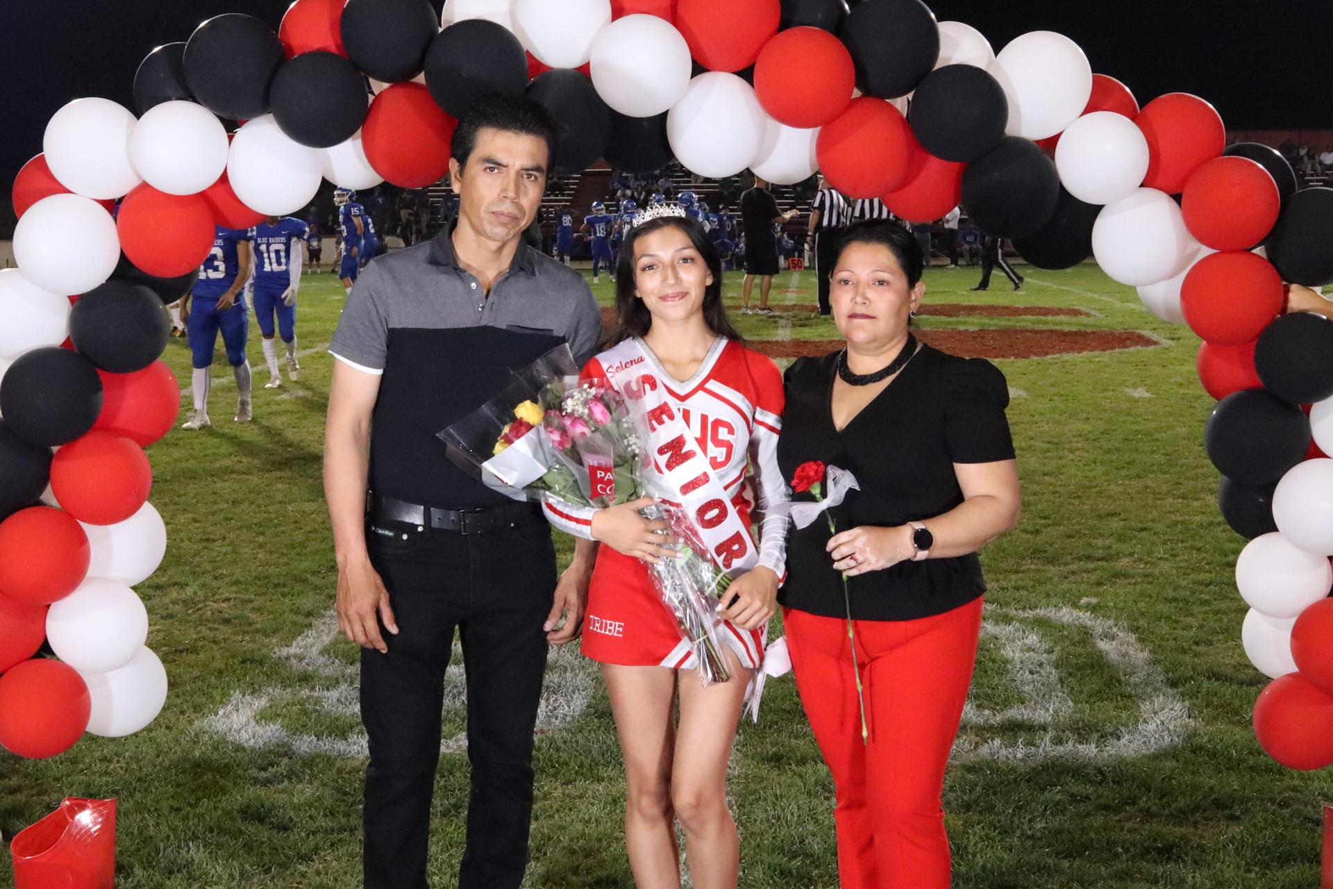 seniors and their escorts celebrating senior night