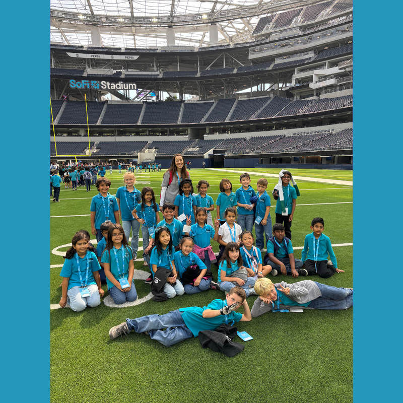 kids on the field of sofi stadium