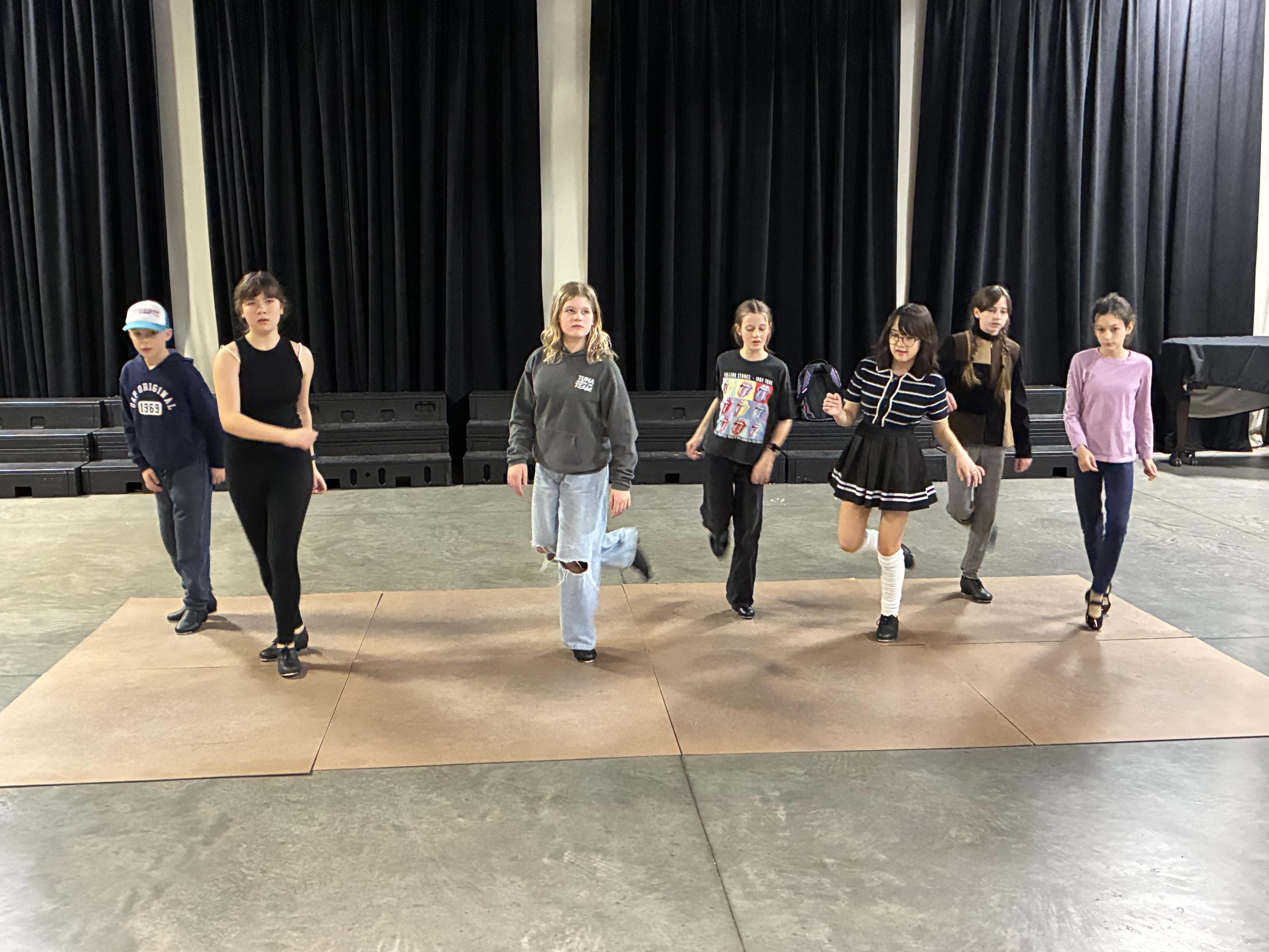 Students learning to tap dance
