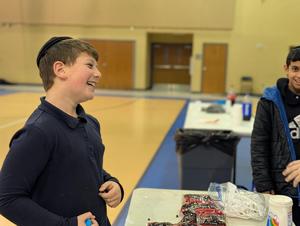 a boy has fun at the carnival