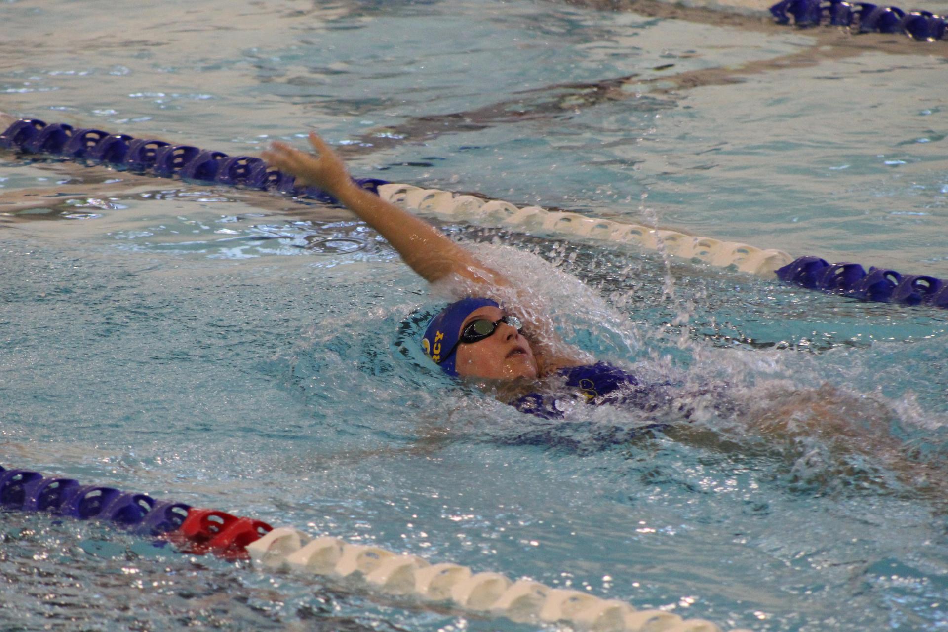 Mercy Swimmer Competing