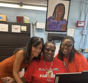 Staff wearing red or orange