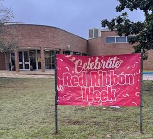Celebrate RRW sign in front yard