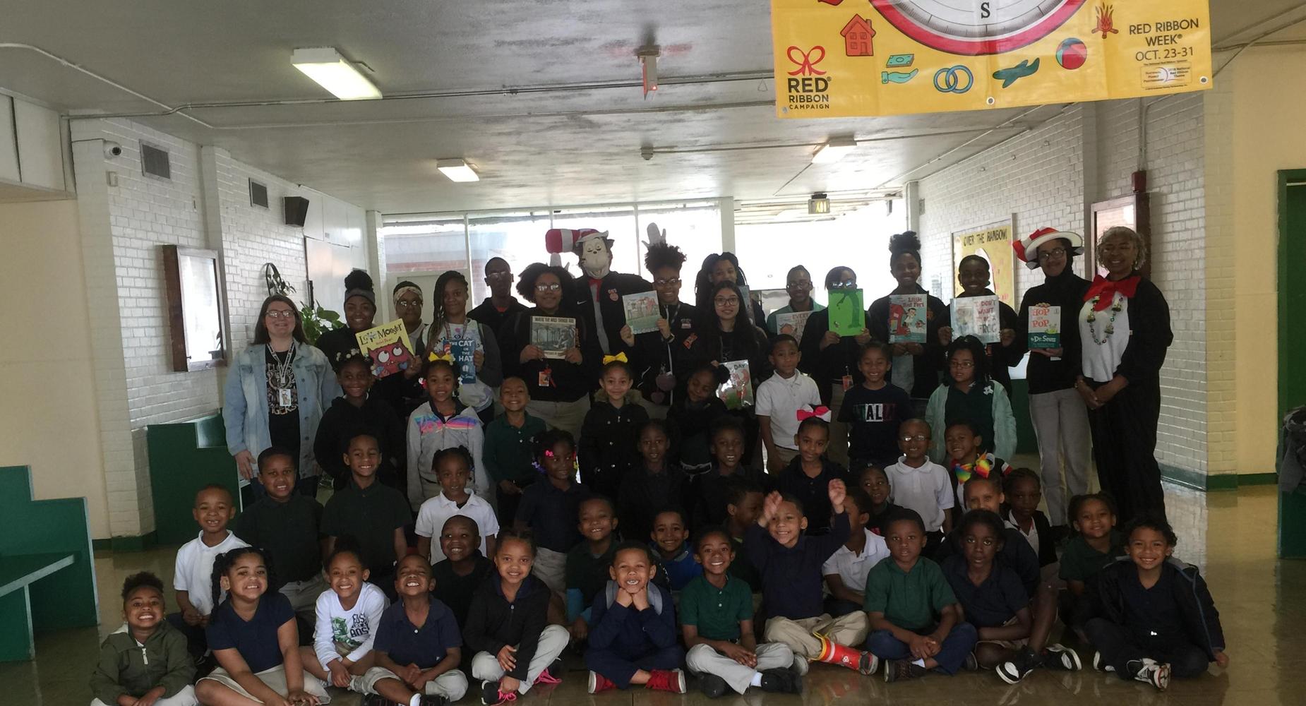 OHS Book Club students read to local elementary school students for Read Across America Day.