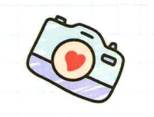 green and blue camera with a hand drawn heart in the centert
