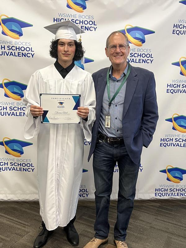 Graduate Thomas Abad with instructor Frank Finch